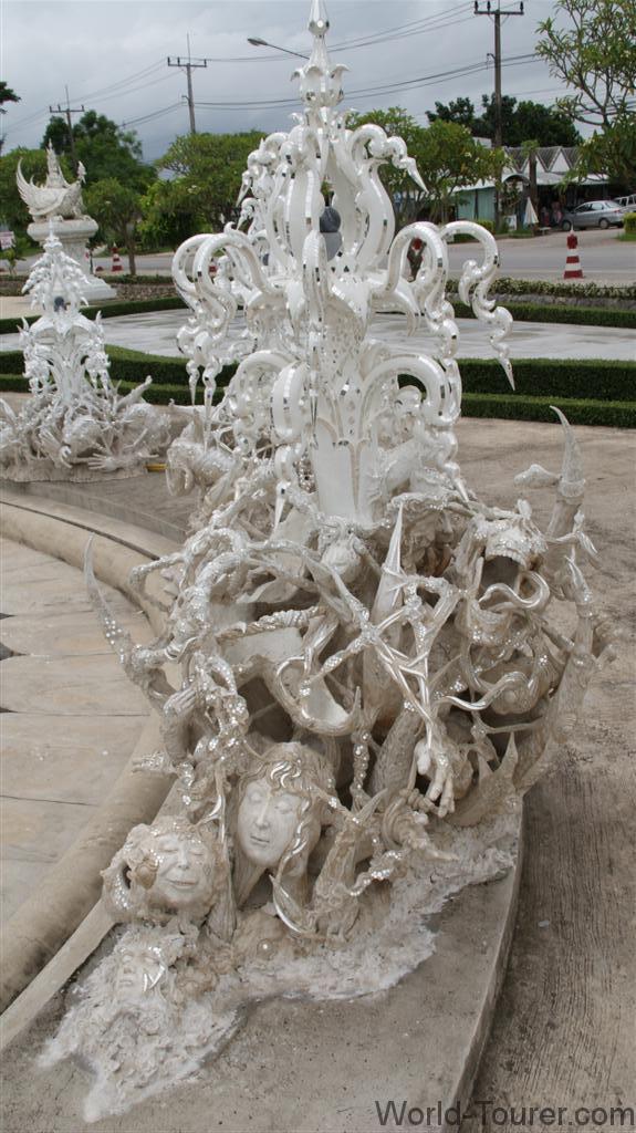 Intricate Statue at The White Temple